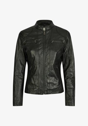 Mustast nahkjakist tõusva kraega, kahel rinnaosal on lukuga taskud ja küljetaskud. Omab figureerivat disaini ja sileda tekstuuri.