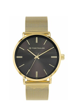 Gold mesh band wristwatch with black dial, gold hour markers, three gold hands, and "Tom Tailor" logo at 12 o'clock.