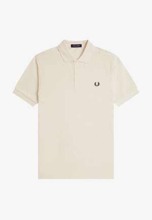 Polo beige à manches courtes avec col, deux boutons et petit logo laurier noir brodé sur la poitrine gauche.