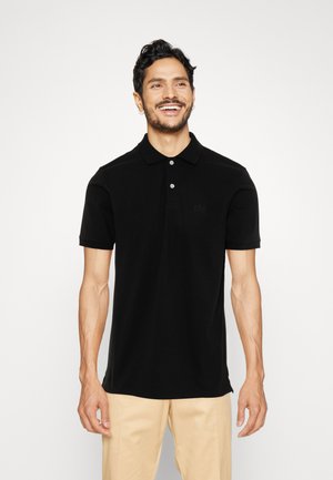 Black polo shirt made of cotton, featuring a classic collar, two-button placket, and subtle logo embroidery on the chest. Short sleeves.