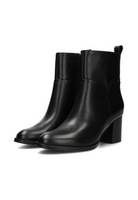 Bottines en cuir noir avec une finition lisse, bout arrondi et talon bloc. Équipées d'une fermeture éclair sur le côté et d'une languette à l'arrière.