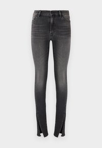 Jeans skinny en denim gris foncé, avec une taille haute, des poches avant et des fentes uniques au niveau de la cheville pour un design moderne.