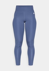 Blå högmidjade leggings gjorda av ett mjukt, töjbart tyg. Har en tonad midja och en liten vit logotyp på övre vänstra låret.
