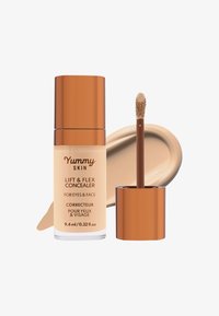 Lift & Flex Concealer in einer frostierten Glasflasche mit einem bronzenen Deckel. Enthält einen Applikatorstab und einen Farbtest des hellbeigen Produkts.