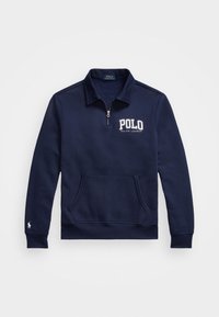 Námořnická modrá mikina s čtvrtinovým zipem, přední kapsou a logem "POLO RALPH LAUREN" v bílé barvě. Obsahuje žebrované manžety a lem.