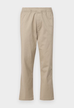 Beige, cotton pants with an elastic waistband, straight leg design, and side seam pockets, featuring a smooth texture and no patterns.