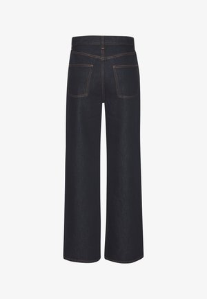 Wide-leg dark denim jeans featuring orange stitching, a mid-rise waist, and two back pockets. Smooth texture with a classic look.