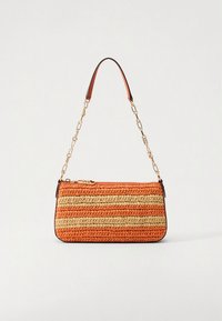 Woven handbag in orange and cream stripes, featuring a zip closure, chain strap, and leather accents. Structured rectangular shape.