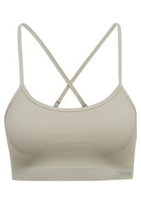 Ljust grå ribbad bralette med tunna, korsande remmar och en sömlös design. Har en logotyp tryckt längst ner till vänster.