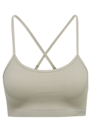 Light gray ribbed bralette with thin, crisscrossing straps and a seamless design. Features a logo printed at the bottom left side.