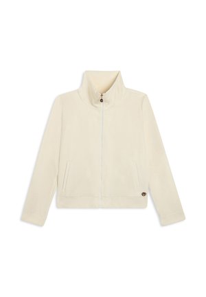 Giacca in fleece color crema con colletto alto, zip frontale, due tasche laterali e logo sulla parte inferiore sinistra. Tessuto morbido, vestibilità rilassata.