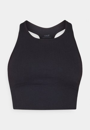 Svart atletisk crop top laget av ribbet materiale, med ermeløs design og rund hals med utskjæringsdetaljer.