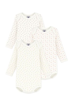 Tre body bianchi per bambini a manica lunga con piccoli motivi a cuore in marrone, rosa e giallo, disposti sovrapposti su uno sfondo bianco.