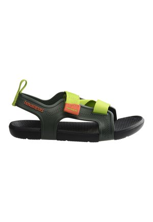 Sandalia Havaianas verde y negra con suela texturizada, tiras ajustables de color verde neón y logo de la marca en naranja en el lateral y en la hebilla de la correa.