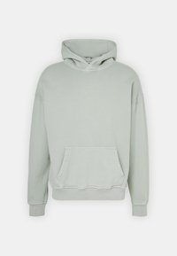 Sudadera con capucha de color verde menta, con un bolsillo canguro, puños acanalados y un corte relajado. Fabricada con un tejido suave y cómodo.