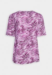 Chemise à manches courtes avec motif abstrait de rayures zèbre violettes et blanches, vue de dos sur un fond uni.