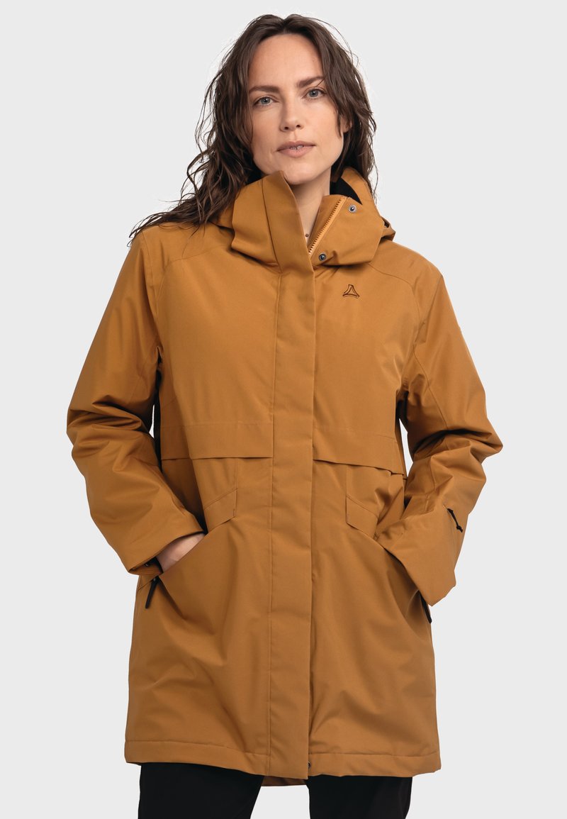 Braune, kapuzenförmige, wasserdichte Jacke aus synthetischem Material mit Druckknopfverschlüssen, zwei Seitentaschen und einem dezenten Logo auf der Brust.