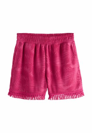 Pink shorts med elastisk talje, subtilt blomsterprint, sidelommer og frynsekant ved kanten.
