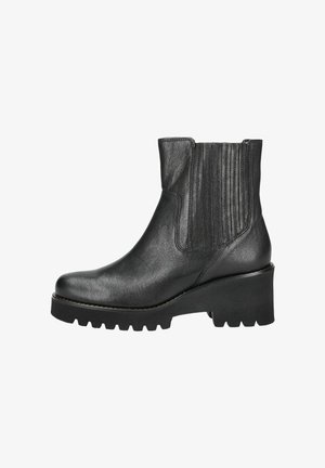 Bottines noires en cuir avec des panneaux latéraux élastiques, un bout arrondi et une semelle chunky à crans. Détails texturés sur l'empeigne.