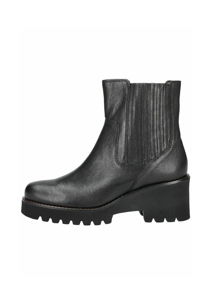 Black leather ankle boots with elastic side panels, a rounded toe, and a chunky, ridged sole. Textured detailing on the upper.