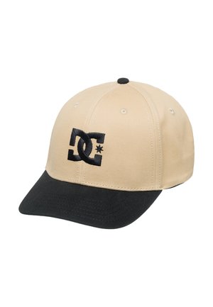 Beige Baseballcap mit schwarzem Schirm, mit einem gestickten schwarzen DC-Logo auf der Vorderseite. Hergestellt aus glattem Stoff mit genähten Details.