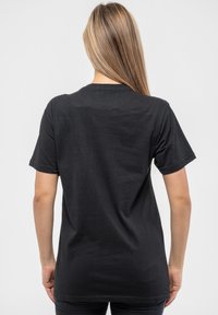Paradiso Clothing AC DC DIAMANTE CLASSIC VOLTAGE LOGO - Print T-shirt - black