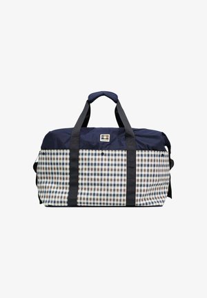 Borsa da viaggio a scacchi blu navy e bianca con manici neri e piccola toppa rettangolare con logo in tessuto sulla parte superiore centrale.