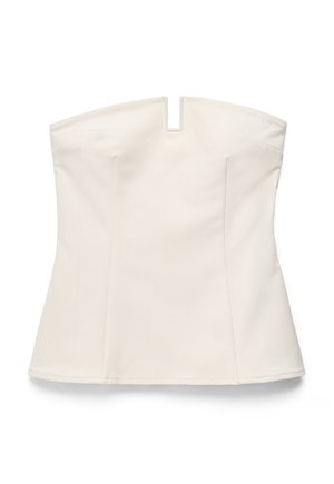 Corsé blanco sin tirantes con una pequeña muesca en el centro delantero y costuras en panel para dar forma.