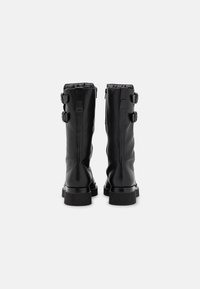 Högl Botas con plataforma - black