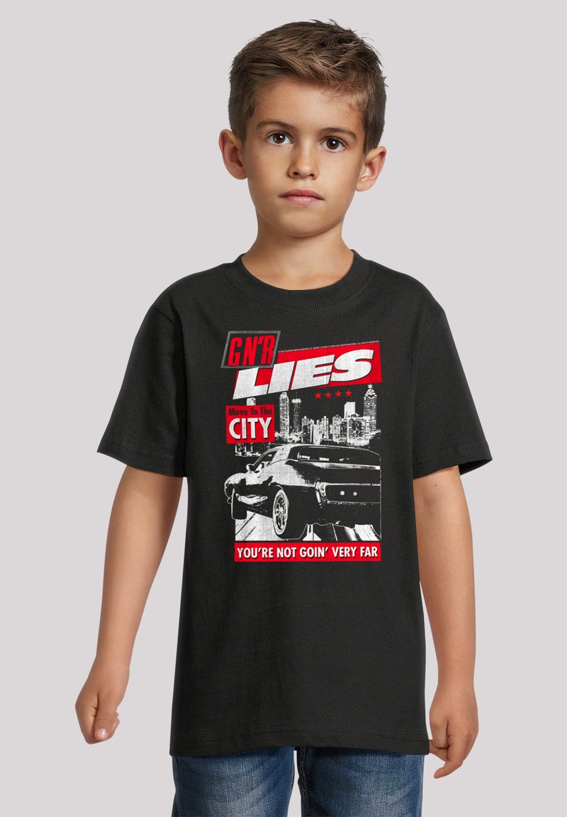 Black cotton t-shirt featuring a graphic print of a car and text in red and white that reads "GN'R LIES" and "YOU'RE NOT GOIN' VERY FAR."