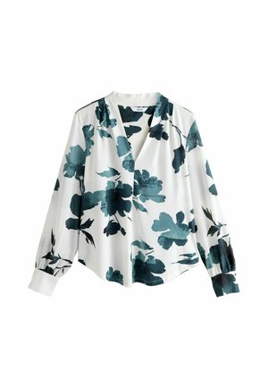 Blouse florale en tissu blanc avec des motifs de fleurs turquoise foncé et verts. Présente un décolleté en V, des manches longues et une silhouette décontractée.