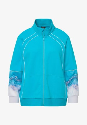 Turkis zip-up jakke med hvide accenter, der har mønstrede ærmer, der ligner agat. Fremstillet af blødt, tekstureret stof.