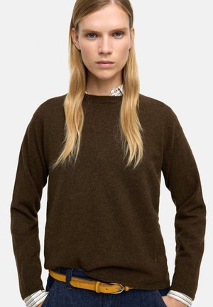 - Sweter