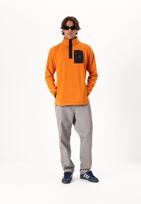 Rip Curl SEARCH POLAR CREW UNISEX  - Sweat polaire - orange amber