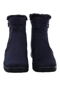 Botines de ante azul marino con un suave collar de piel sintética, cierre de cremallera lateral y suela de goma texturizada para un mejor agarre.