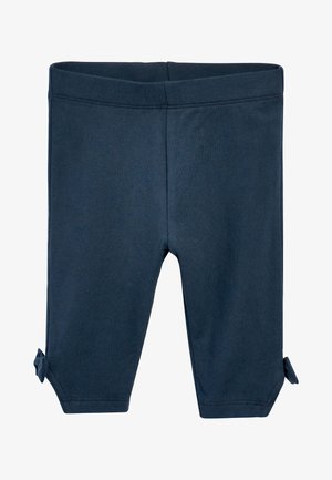 Leggings stretch blu navy con una consistenza morbida, caratterizzati da un orlo piegato con dettagli a nodo alla base di ciascun gambale.