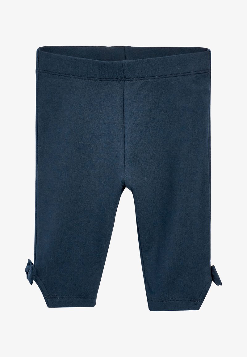 Donkerblauwe stretchlegging met een gladde textuur, voorzien van een omgeslagen zoom met knoopdetails aan de onderkant van elke pijp.