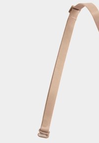Adjustable beige bra strap with plastic slider and hook on a white background.