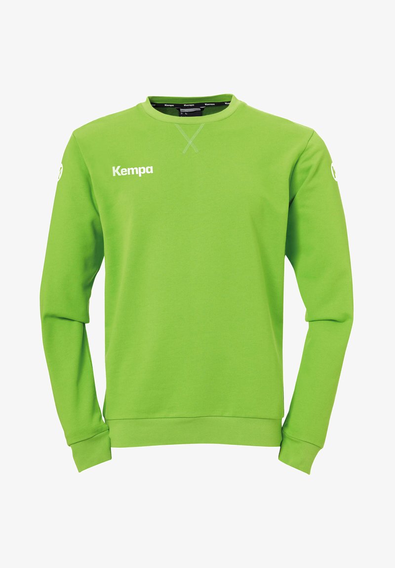 Groene sweatshirt van zacht materiaal, met een ronde hals, lange mouwen en de merknaam "Kempa" in het wit op de voorkant gedrukt.