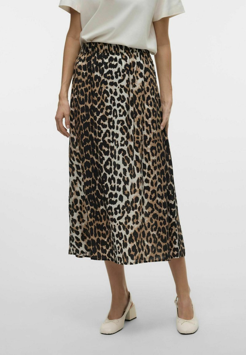 Falda midi de estampado de leopardo en tejido suave con cinturilla elástica, que presenta tonos de marrón y negro sobre un fondo crema.