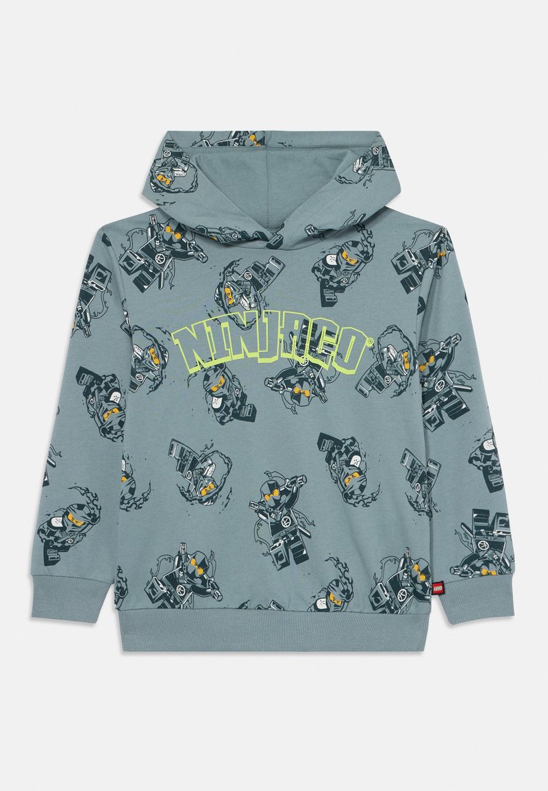 Felpa grigia con stampa ripetuta di personaggi Ninjago, scritta 'Ninjago' davanti in giallo brillante, polsini a costine e tasca a marsupio.