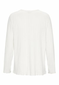 Vit långärmad topp med ribbat mönster, rund halsringning och råkantig nederkant. Inga synliga knäppningar eller mönster.