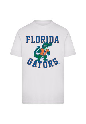 White cotton T-shirt featuring "FLORIDA GATORS" text in orange and blue, with a green alligator mascot wearing an orange shirt.