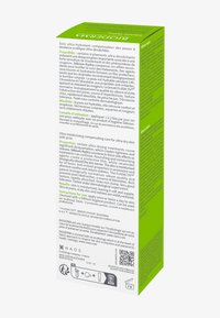 Groene doosverpakking met witte tekst met instructies en eigenschappen voor een ultra-hydraterend huidverzorgingsproduct, gemarkeerde ingrediënten en logo.