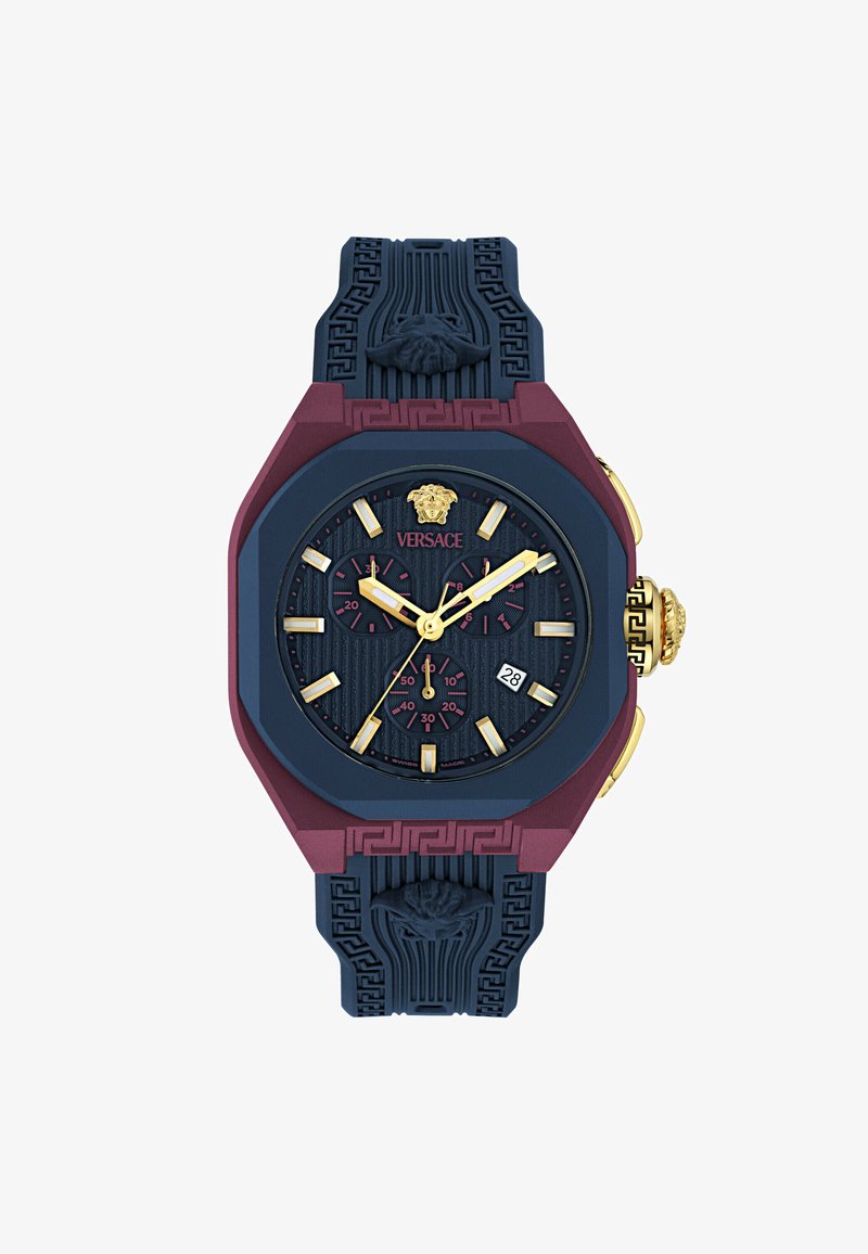 Versace asto stila pulkstenis ar tumši zilu gumijas siksnu, bordo korpusu, zelta akcentiem, teksturētu ciparnīcu un lauvu galvas detaļām uz siksnas. Iekļauta datuma rādītāja funkcija.