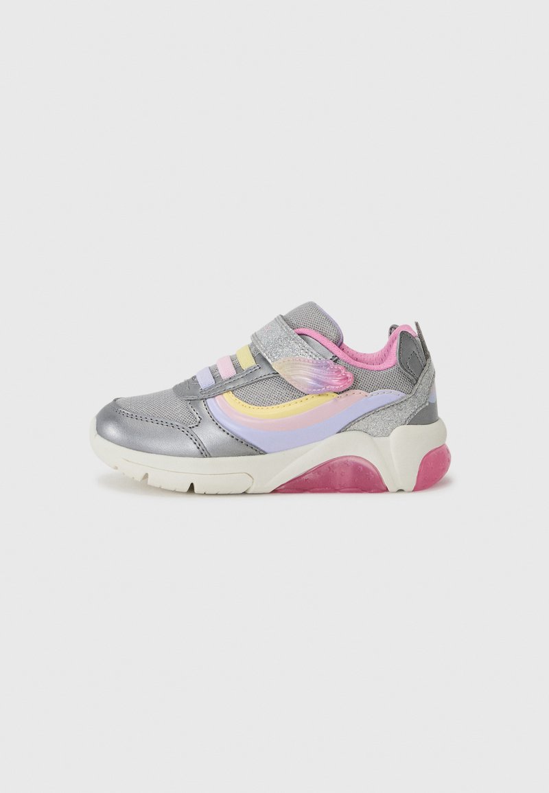 Gray athletic shoe with a velcro strap, features pastel accents in purple, yellow, and pink, textured upper, chunky white sole with pink detail.