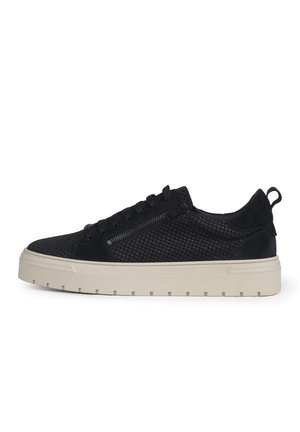 Low-top black sneaker with textured side panels, lace-up front, side zipper, and thick off-white rubber sole.
