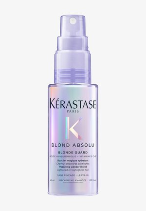 Kleine iriserende sprayfles van Kérastase Blond Absolu Blonde Guard hydraterende leave-in behandeling voor lichtgekleurd of gehighlight haar.