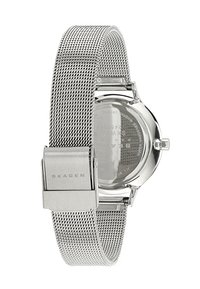 Montre avec bracelet en maille argentée, boîtier rond en acier inoxydable, design minimaliste, cadran clair et fermoir sécurisé marqué "SKAGEN."