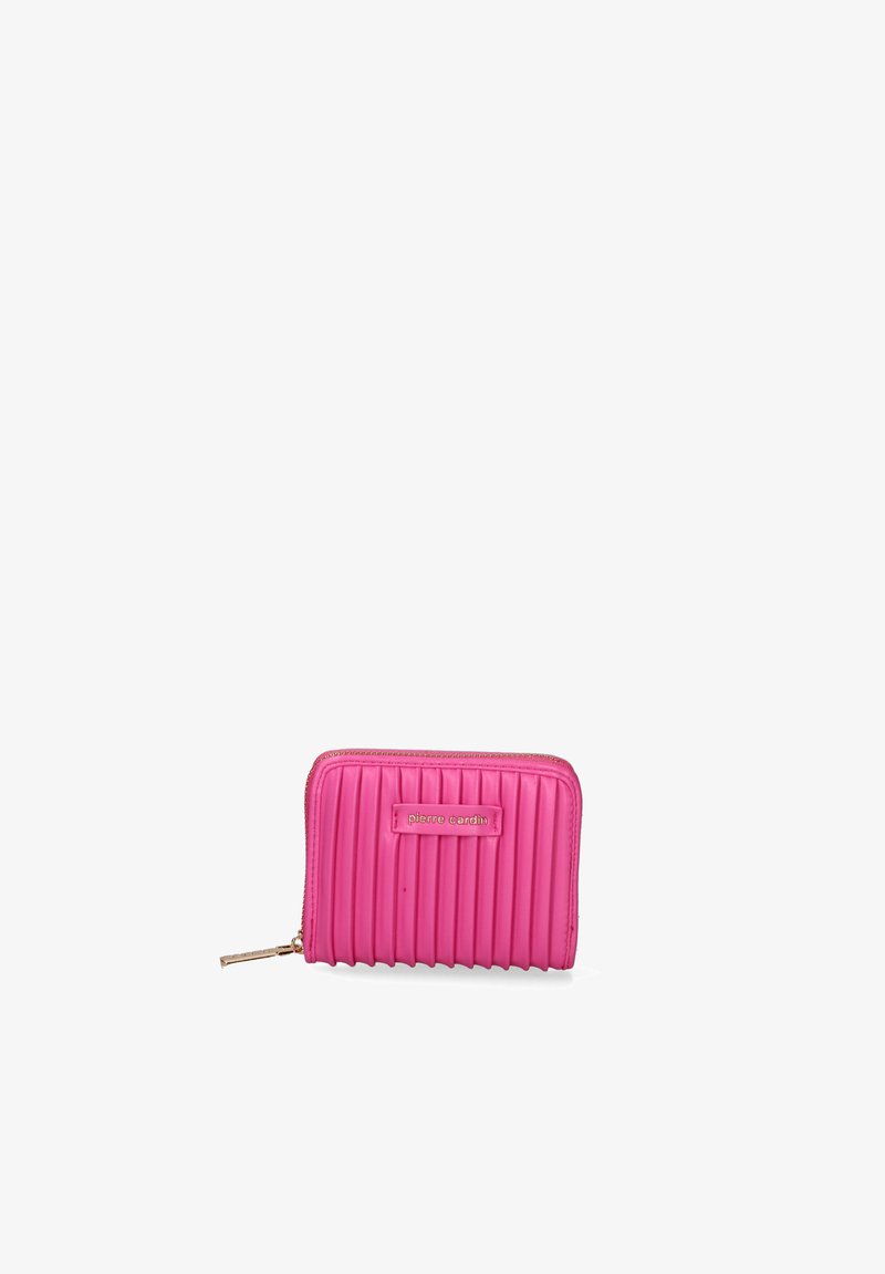 Pink ribbed wallet made of smooth material with a golden zipper and a branded tag. The design features vertical grooves across its surface.